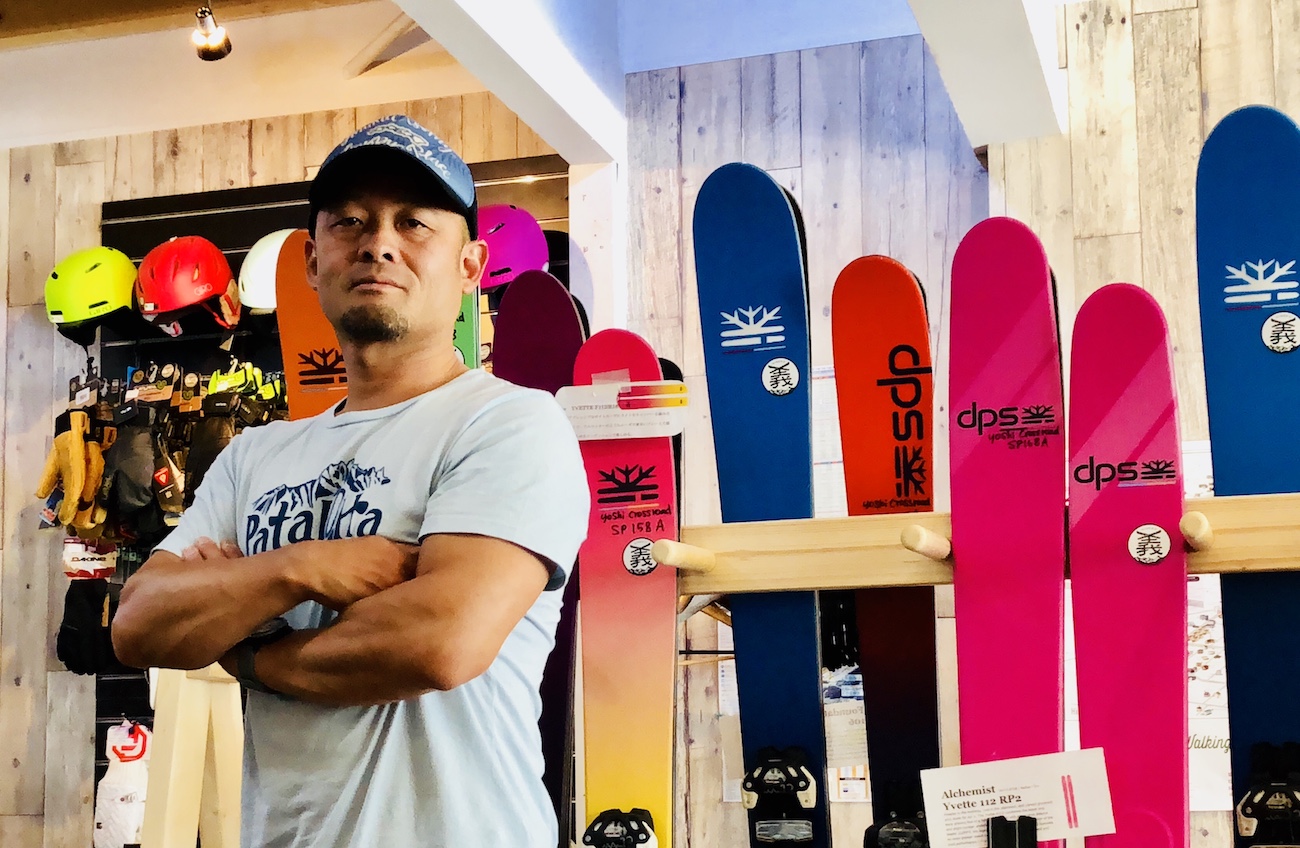 Yoshihito Tanaka standing inside Rental Shop Yoshi